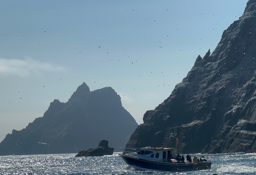 boat view of little skellig and skellig michael