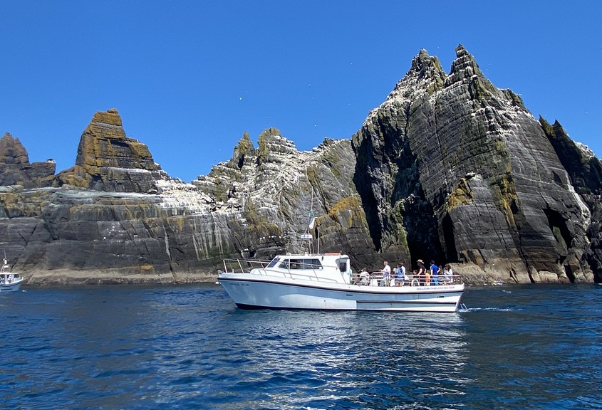 a skellig michael tour boat passing little skellig island